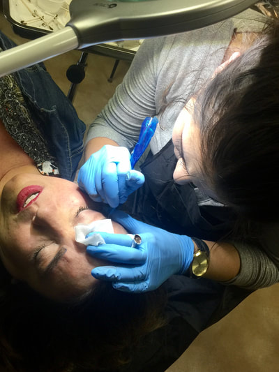 Microblading Student performing procedure during training.
